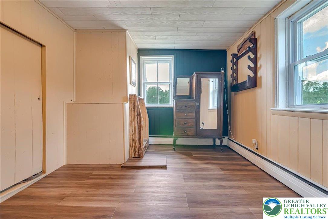 173 Anchorage Road Saylorsburg, PA 18353 - Photo 35 of 75 a view of a refrigerator in kitchen and wooden floor