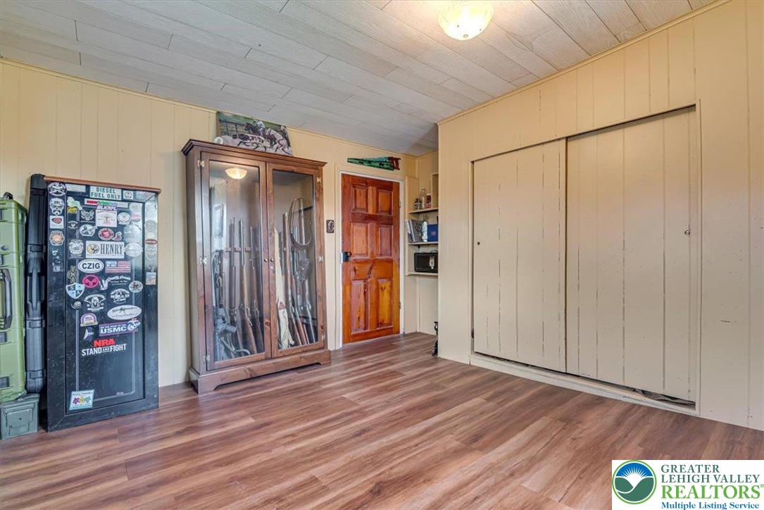 173 Anchorage Road Saylorsburg, PA 18353 - Photo 36 of 75 a view of a hallway with wooden floor and closet