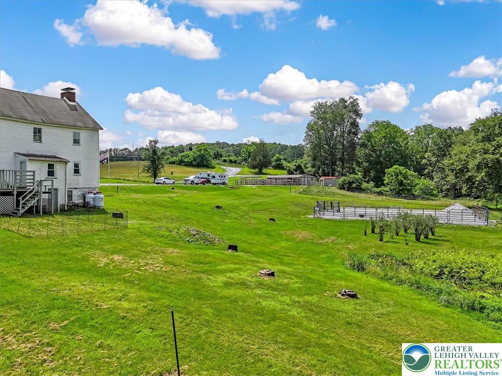 173 Anchorage Road Saylorsburg, PA 18353 - Photo 61 of 75 a view of a big yard with a swimming pool