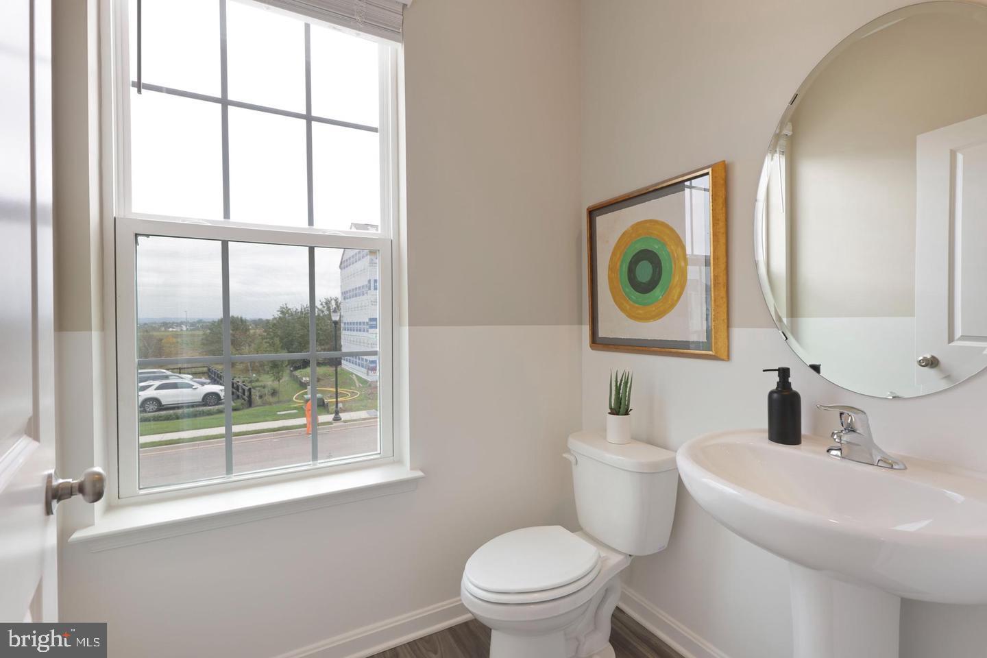 1995 Fauna Drive Frederick, MD 21702 - Photo 8 of 20 a bathroom with a toilet a sink and a window