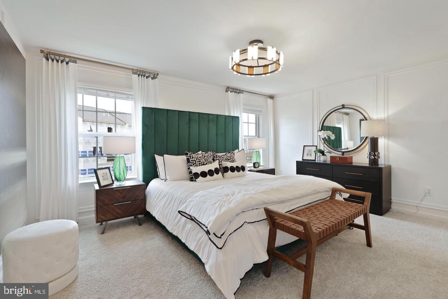 1995 Fauna Drive Frederick, MD 21702 - Photo 10 of 20 a bedroom with a bed and a chandelier