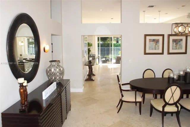 a view of a livingroom with furniture and windows