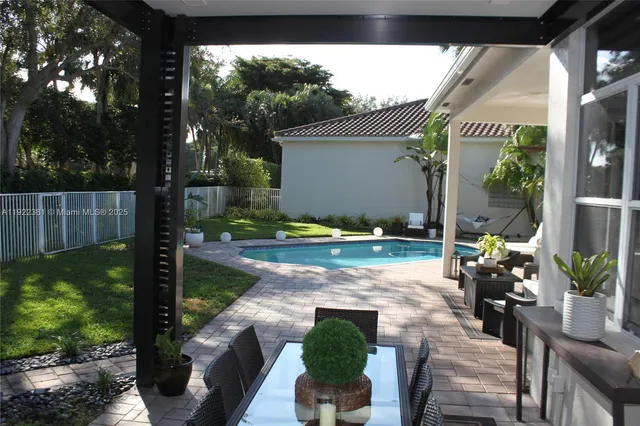 a view of a porch with garden