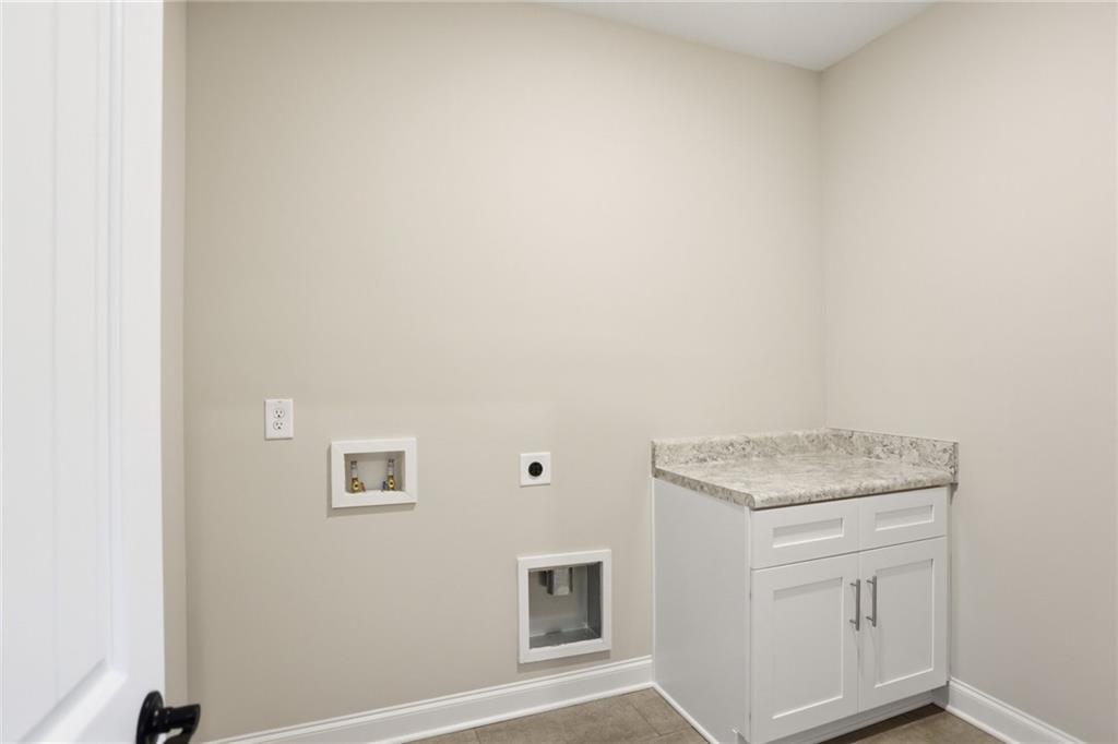 222 Trecastle Square, Unit 21 Canton, GA 30114 - Photo 23 of 33 a bathroom with a sink