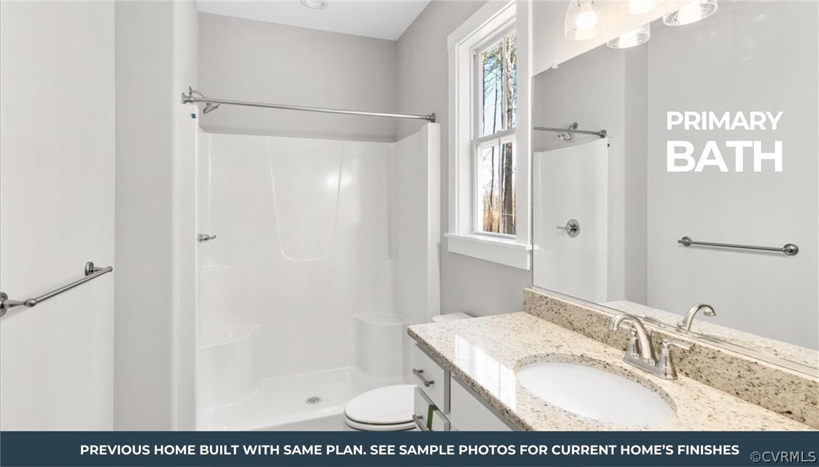 4724 Country Club Road La Crosse, VA 23950 - Photo 15 of 17 a bathroom with a granite countertop sink a mirror and shower