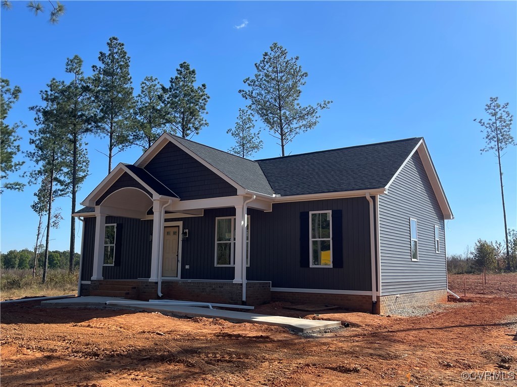 4724 Country Club Road La Crosse, VA 23950 - Photo 2 of 17 a front view of a house with a yard