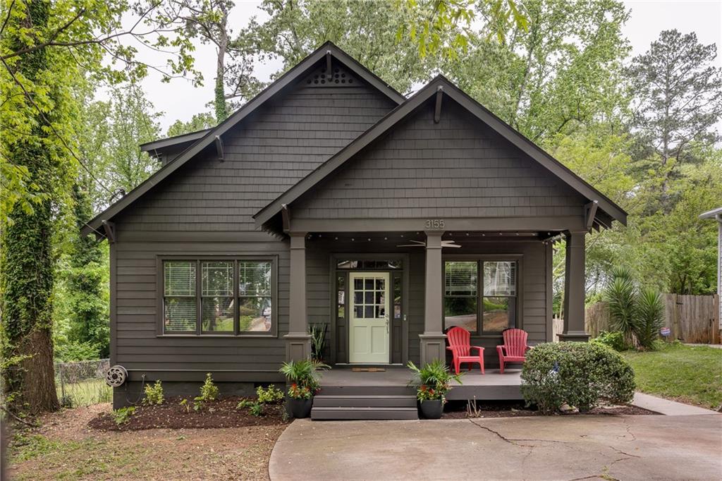 3155 Alston Drive Decatur, GA 30032 - Photo 1 of 1 a front view of a house with garden