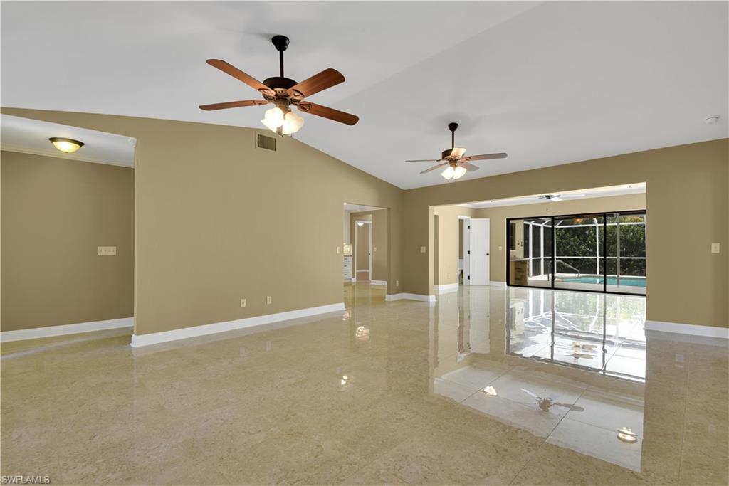 17557 Butler Road Fort Myers, FL 33967 - Photo 15 of 35 a view of a livingroom with a ceiling fan and window