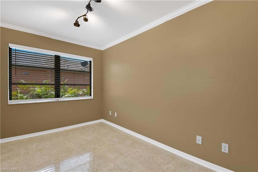 17557 Butler Road Fort Myers, FL 33967 - Photo 18 of 35 a view of an empty room with a window