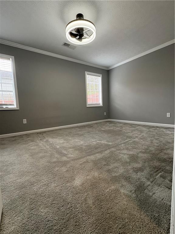 701 Pine Tree Trail, Unit 10E Atlanta, GA 30349 - Photo 13 of 33 a view of an empty room with a window