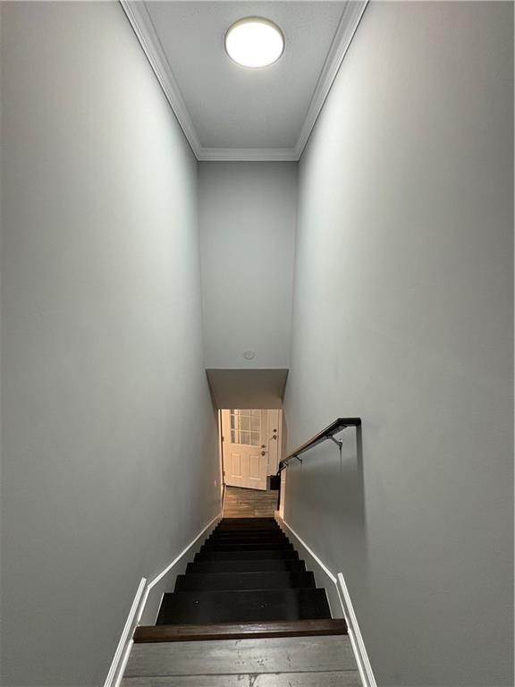 701 Pine Tree Trail, Unit 10E Atlanta, GA 30349 - Photo 22 of 33 a view of an empty room and wooden floor