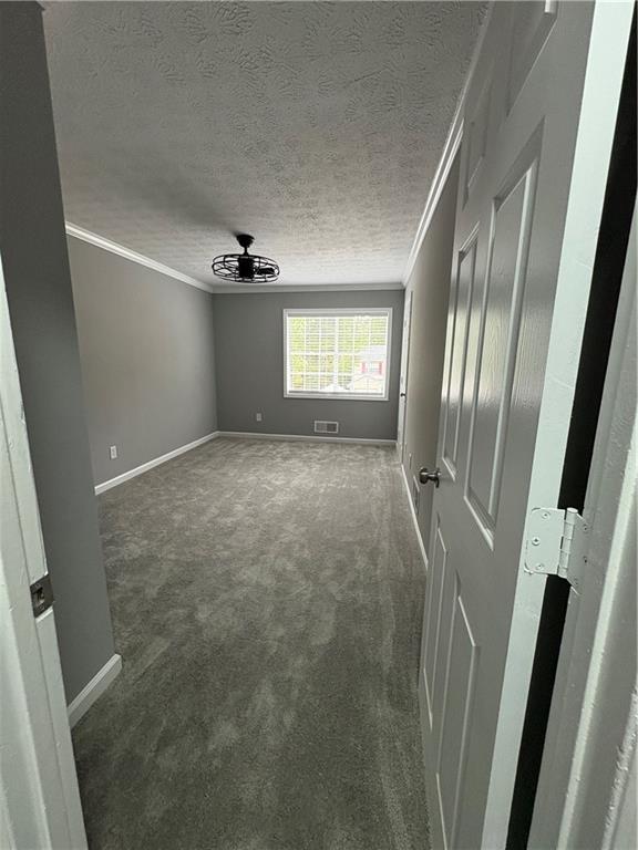 701 Pine Tree Trail, Unit 10E Atlanta, GA 30349 - Photo 24 of 33 a view of a livingroom with a staircase