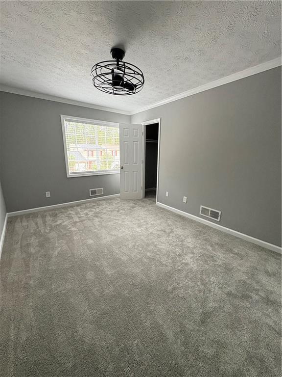 701 Pine Tree Trail, Unit 10E Atlanta, GA 30349 - Photo 25 of 33 a view of an empty room with a window
