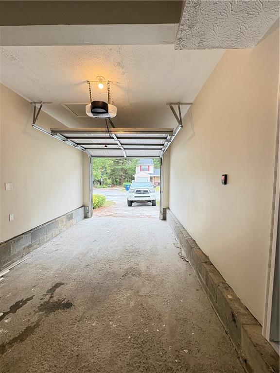 701 Pine Tree Trail, Unit 10E Atlanta, GA 30349 - Photo 29 of 33 a view of hallway with furniture and a window