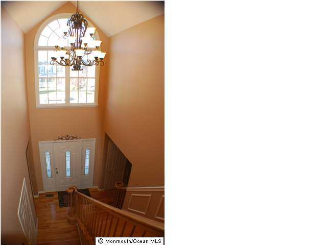 142 Daybreak Court Brick, NJ 08724 - Photo 2 of 3 a view of entryway and kitchen