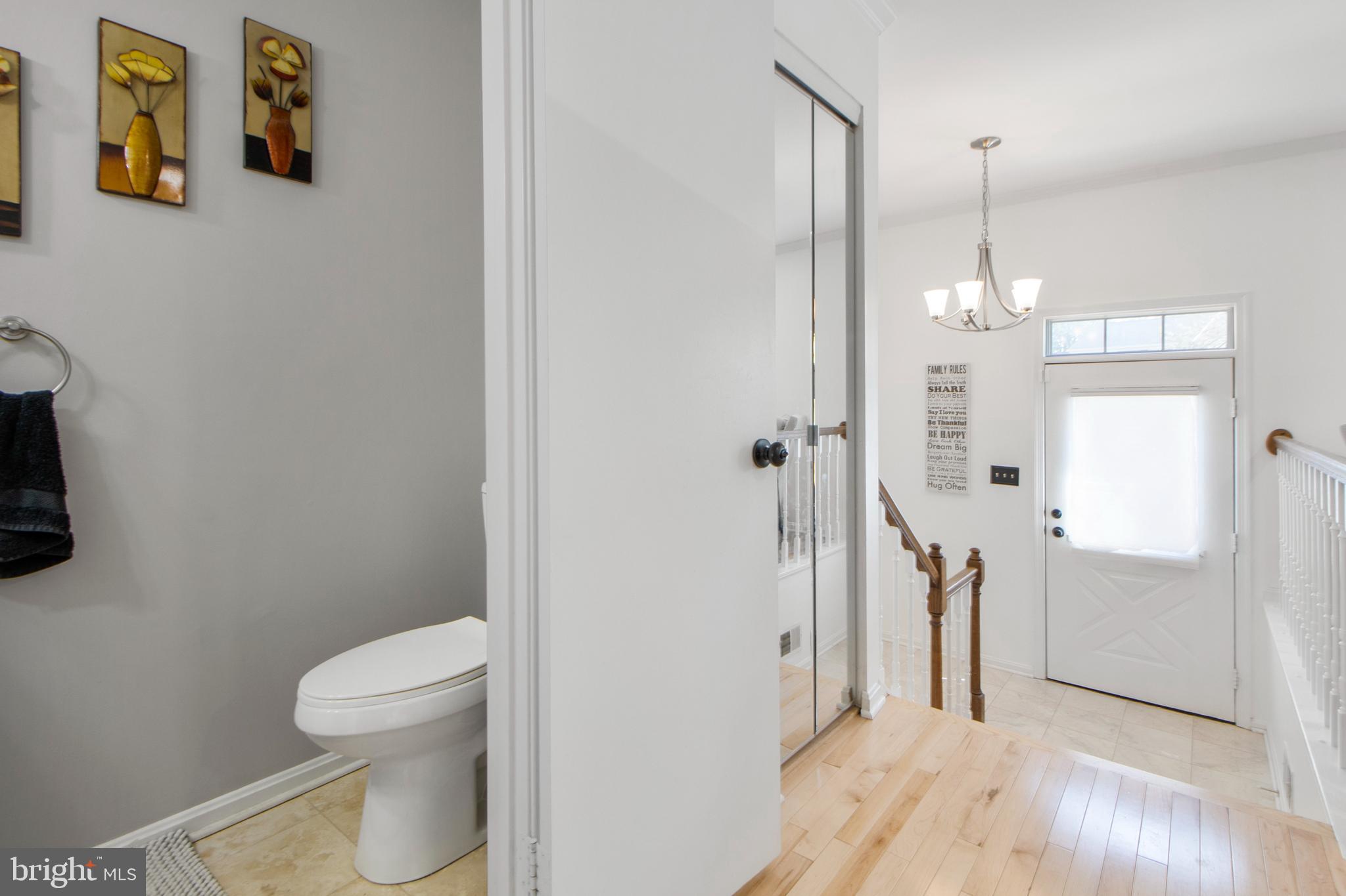 14432 Bakersfield Court Silver Spring, MD 20906 - Photo 14 of 60 a bathroom with a toilet sink and shower