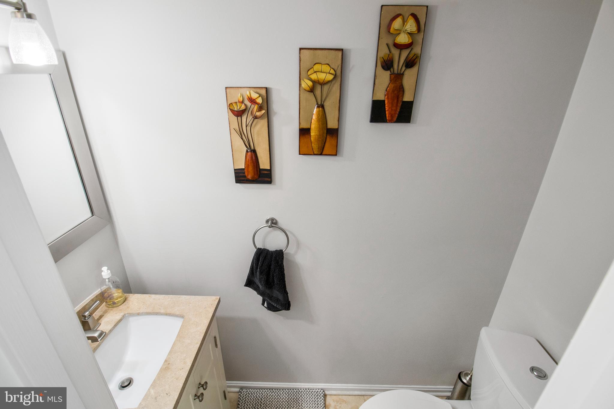 14432 Bakersfield Court Silver Spring, MD 20906 - Photo 15 of 60 a bathroom with a shower and toilet