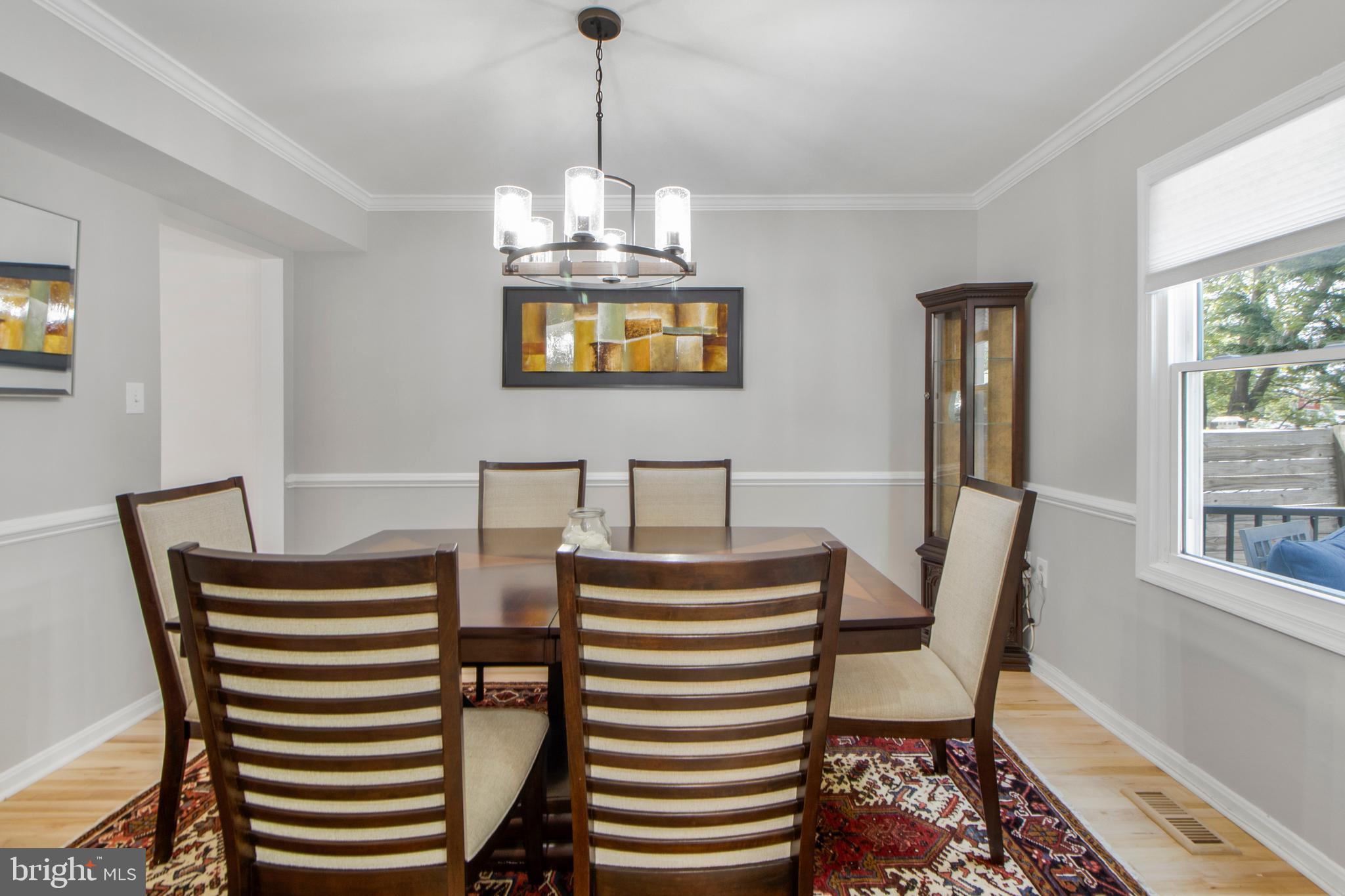14432 Bakersfield Court Silver Spring, MD 20906 - Photo 24 of 60 a view of a dining room with furniture