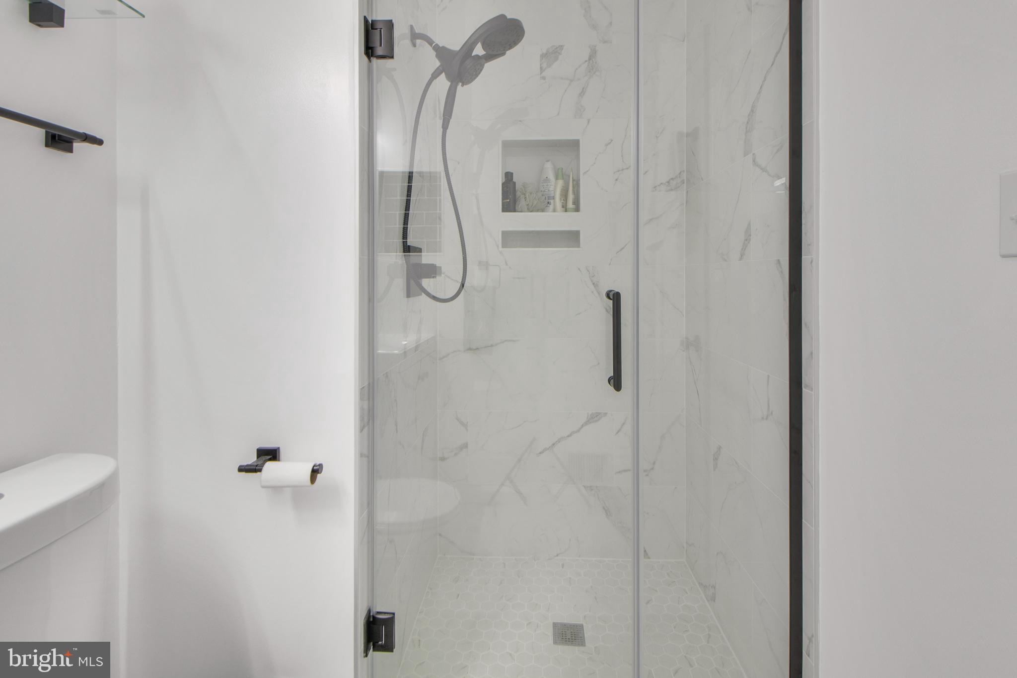 14432 Bakersfield Court Silver Spring, MD 20906 - Photo 40 of 60 a bathroom with a shower