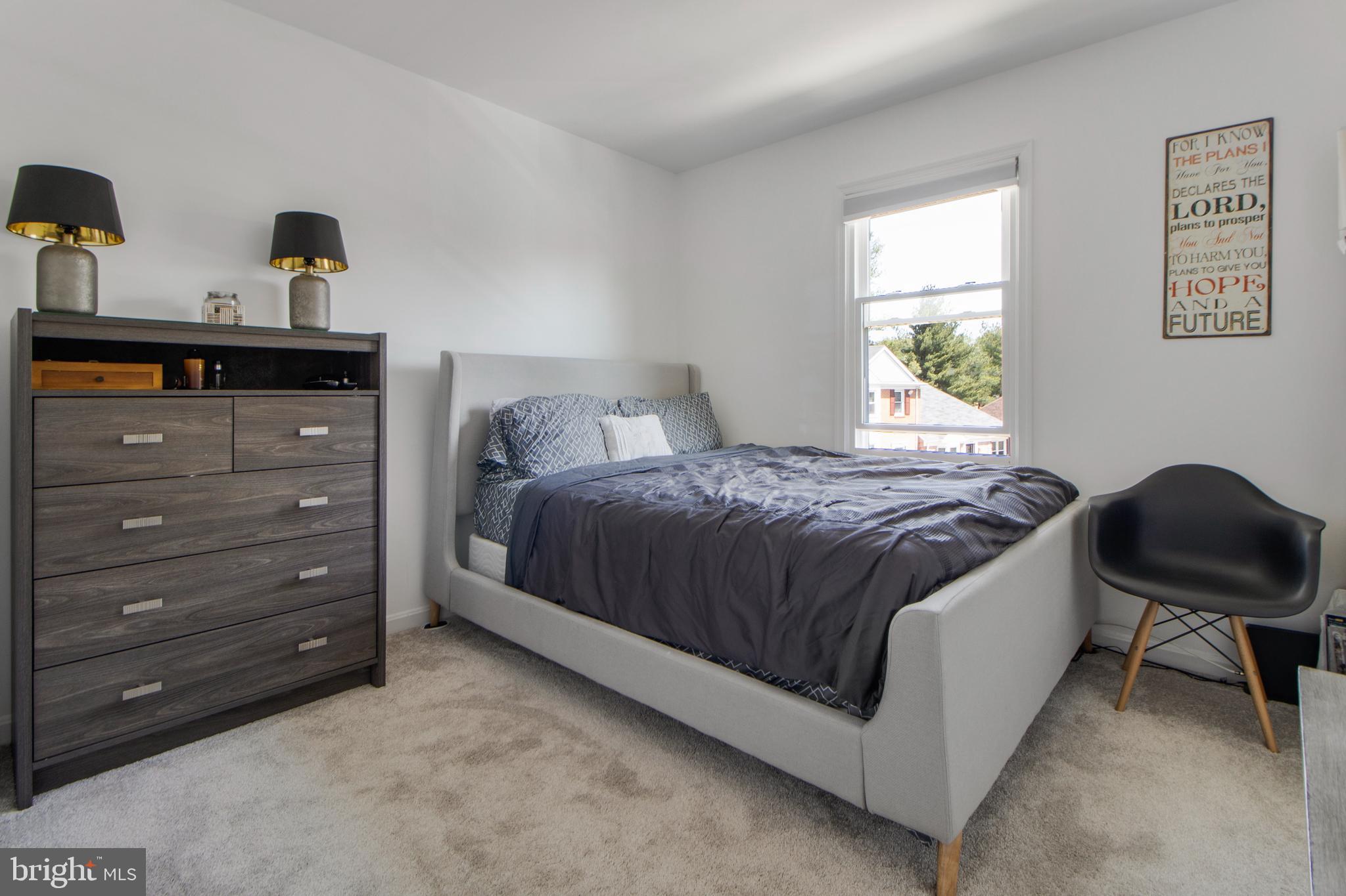14432 Bakersfield Court Silver Spring, MD 20906 - Photo 41 of 60 a bedroom with a bed and window