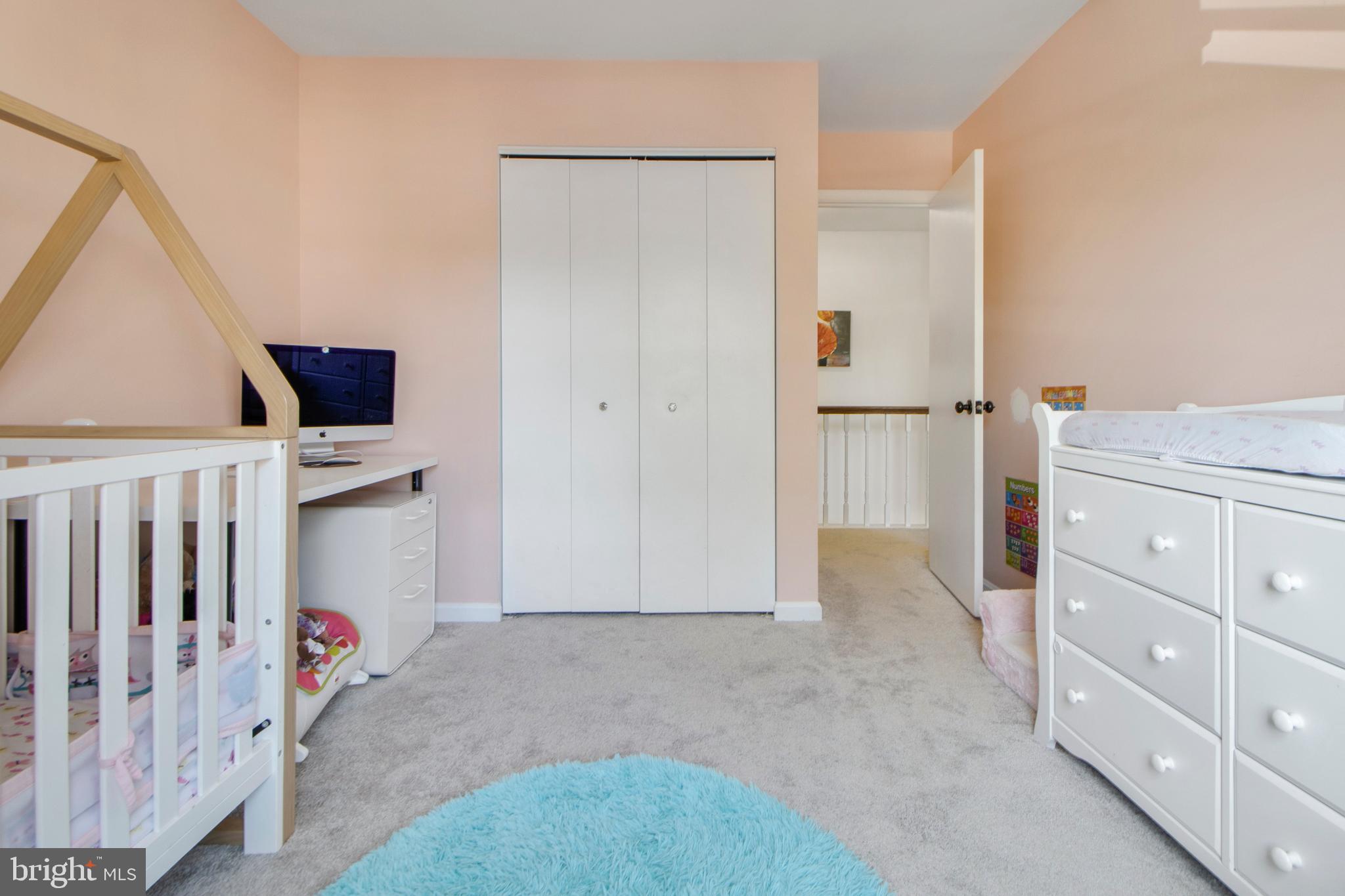 14432 Bakersfield Court Silver Spring, MD 20906 - Photo 45 of 60 a view of hallway with washer and dryer