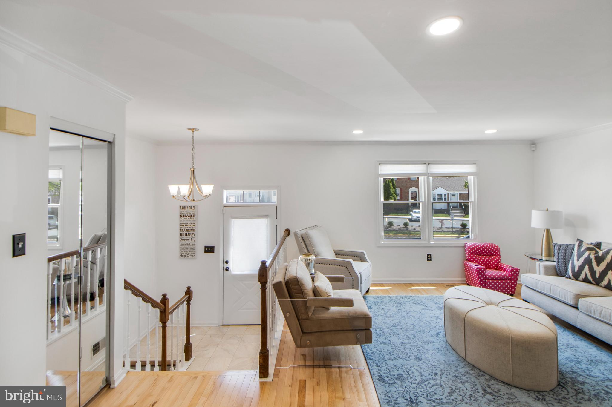 14432 Bakersfield Court Silver Spring, MD 20906 - Photo 8 of 60 a living room with furniture and wooden floor