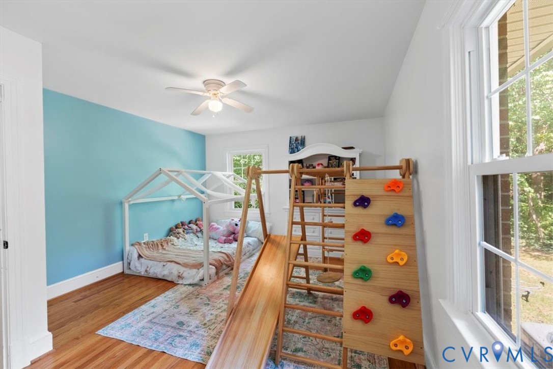2210 Cartersville Road Cartersville, VA 23027 - Photo 14 of 32 a bedroom with baby crib and a window