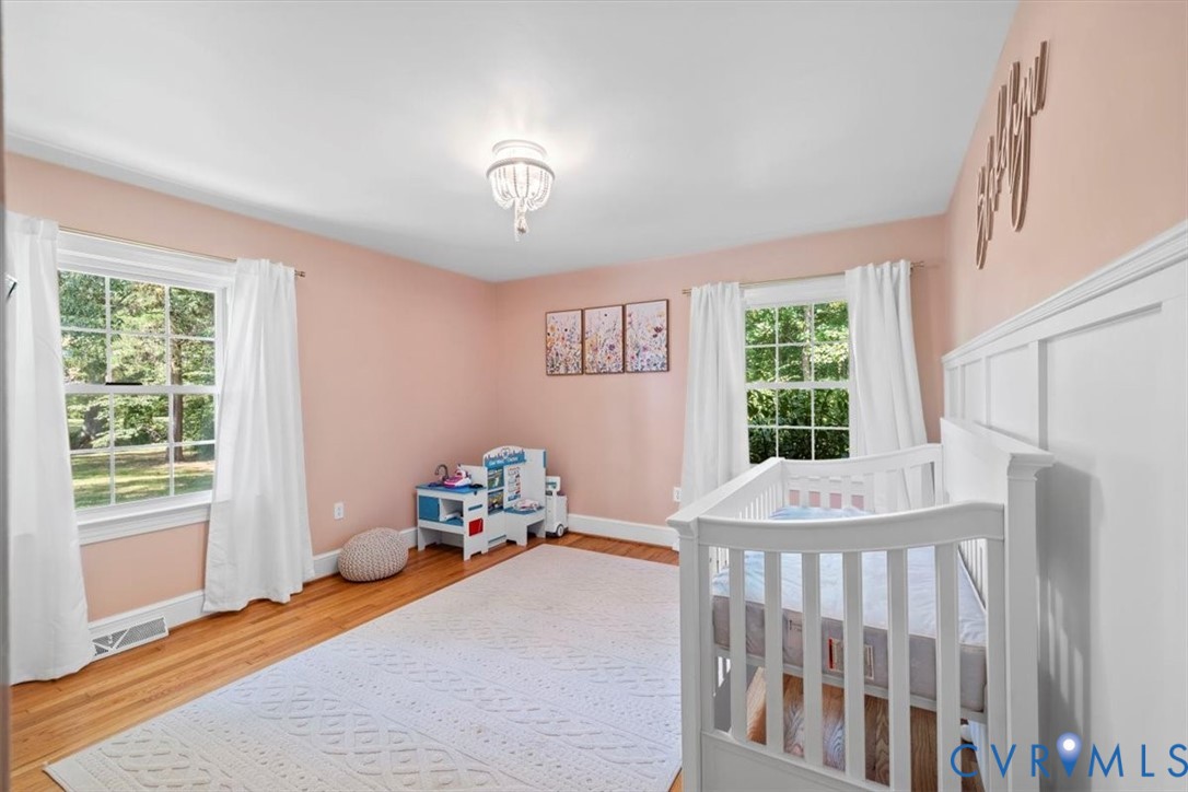 2210 Cartersville Road Cartersville, VA 23027 - Photo 16 of 32 a bedroom with furniture and a large window
