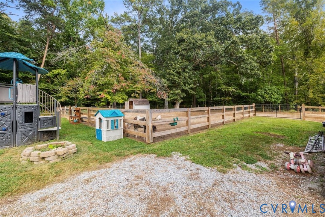 2210 Cartersville Road Cartersville, VA 23027 - Photo 25 of 32 a view of a backyard with sitting area