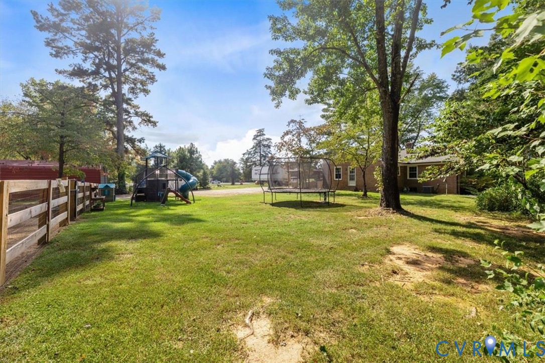 2210 Cartersville Road Cartersville, VA 23027 - Photo 26 of 32 a view of yard with tree and green space
