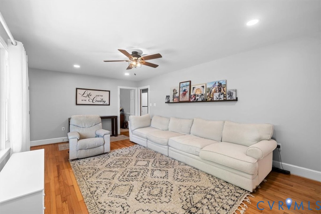 2210 Cartersville Road Cartersville, VA 23027 - Photo 3 of 32 a living room with furniture and a couch