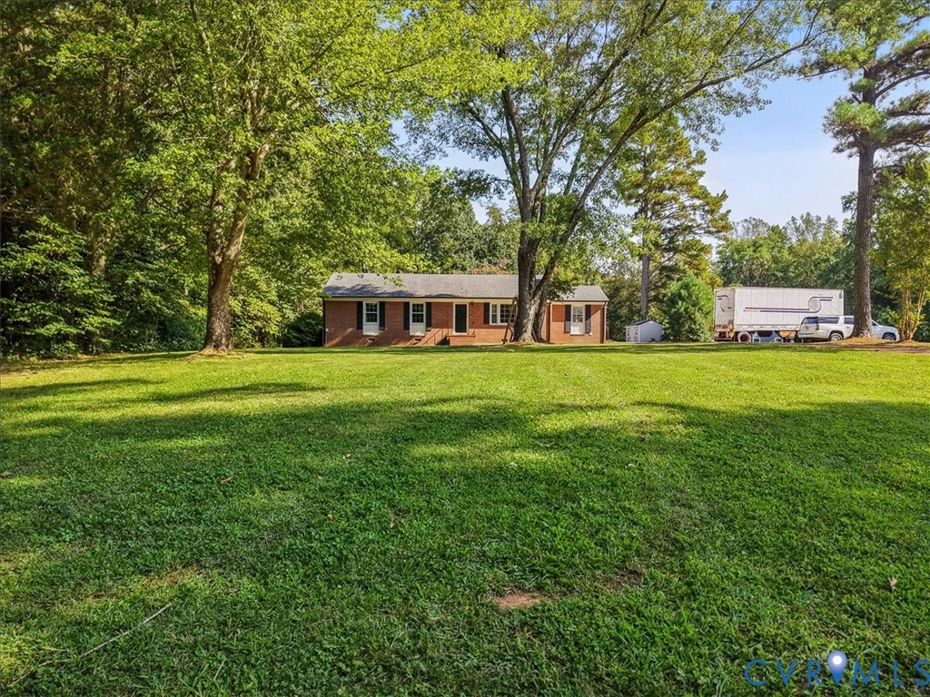 2210 Cartersville Road Cartersville, VA 23027 - Photo 32 of 32 a view of a house with a big yard