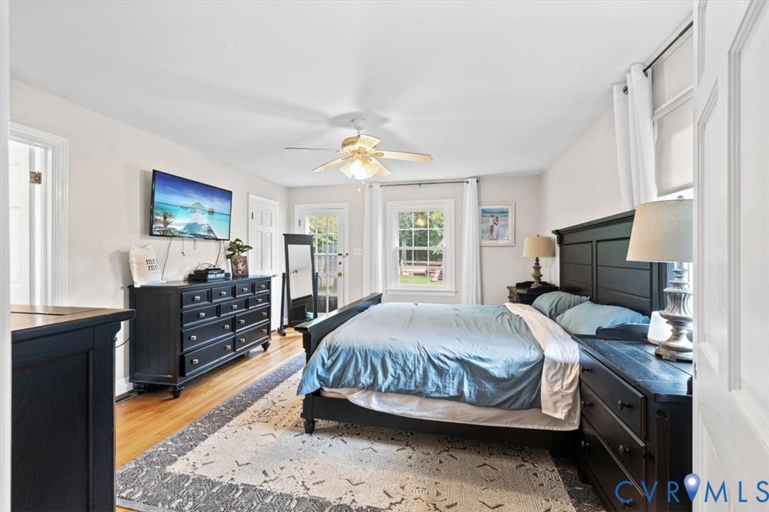 2210 Cartersville Road Cartersville, VA 23027 - Photo 9 of 32 a bedroom with a bed and a flat screen tv