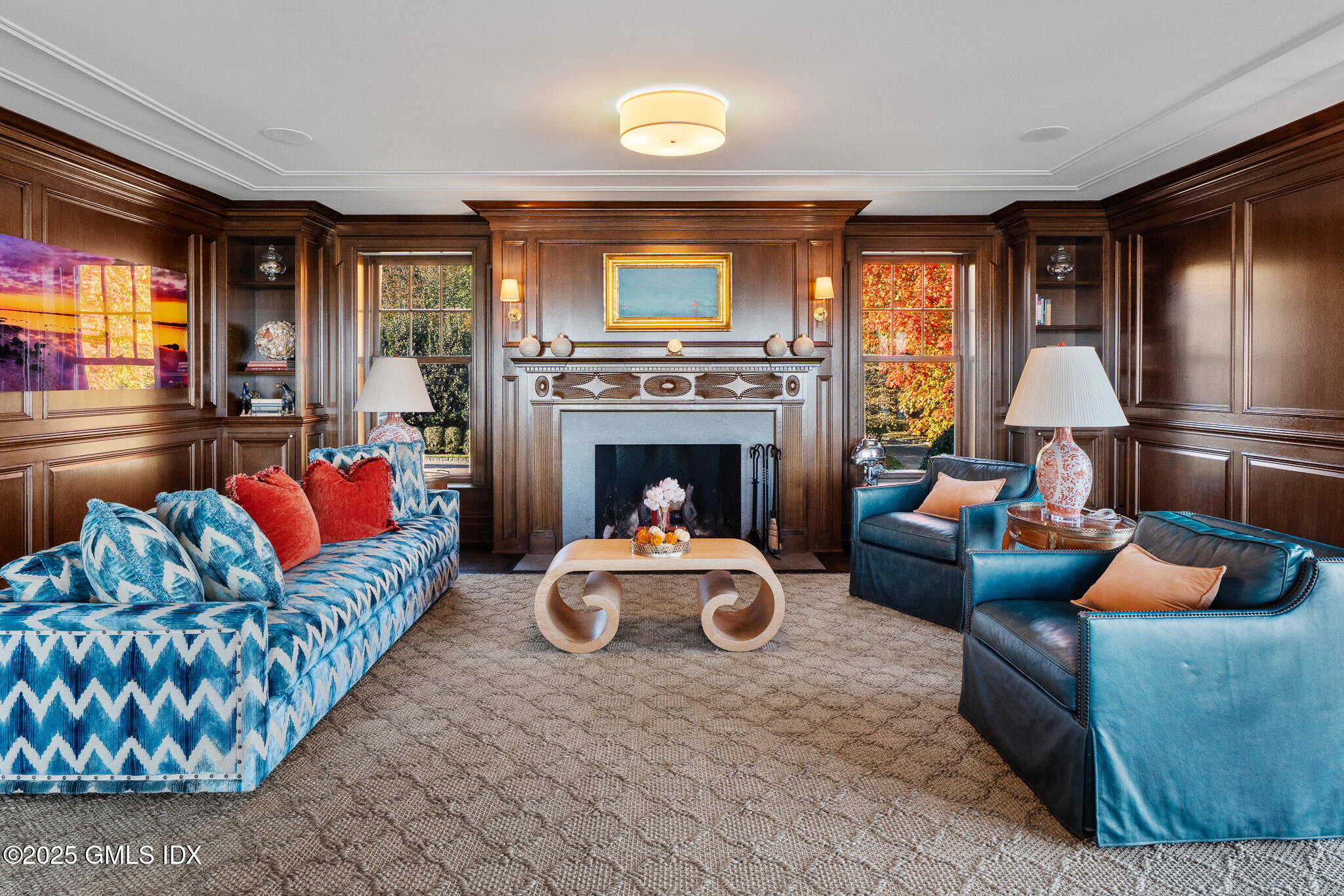 545 Indian Field Road Greenwich, CT 06830 - Photo 15 of 39 a living room with furniture fireplace and flat screen tv
