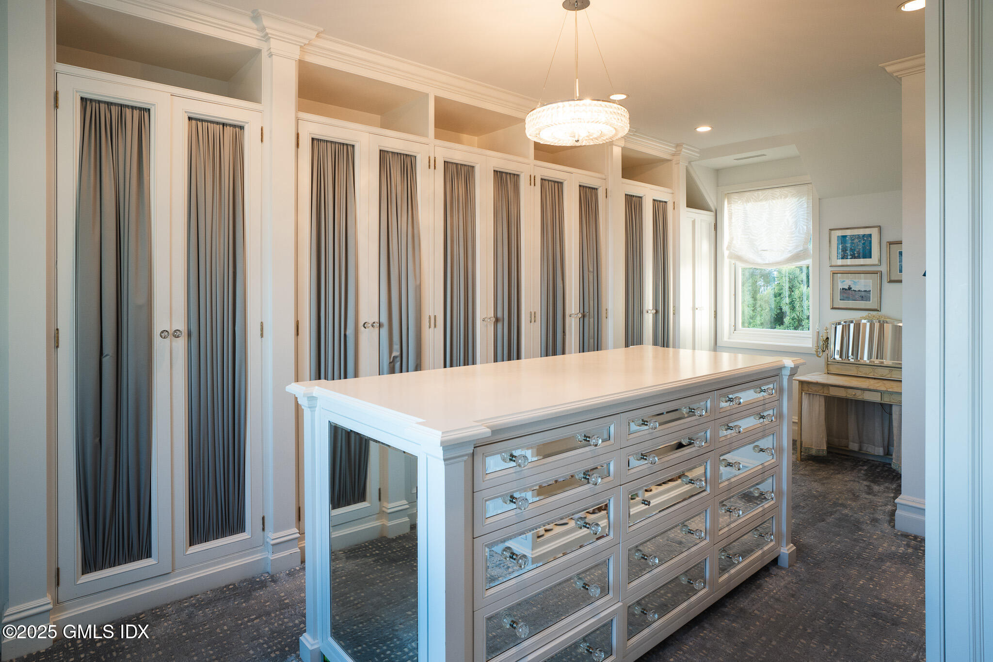 545 Indian Field Road Greenwich, CT 06830 - Photo 20 of 39 a kitchen with a table and chairs