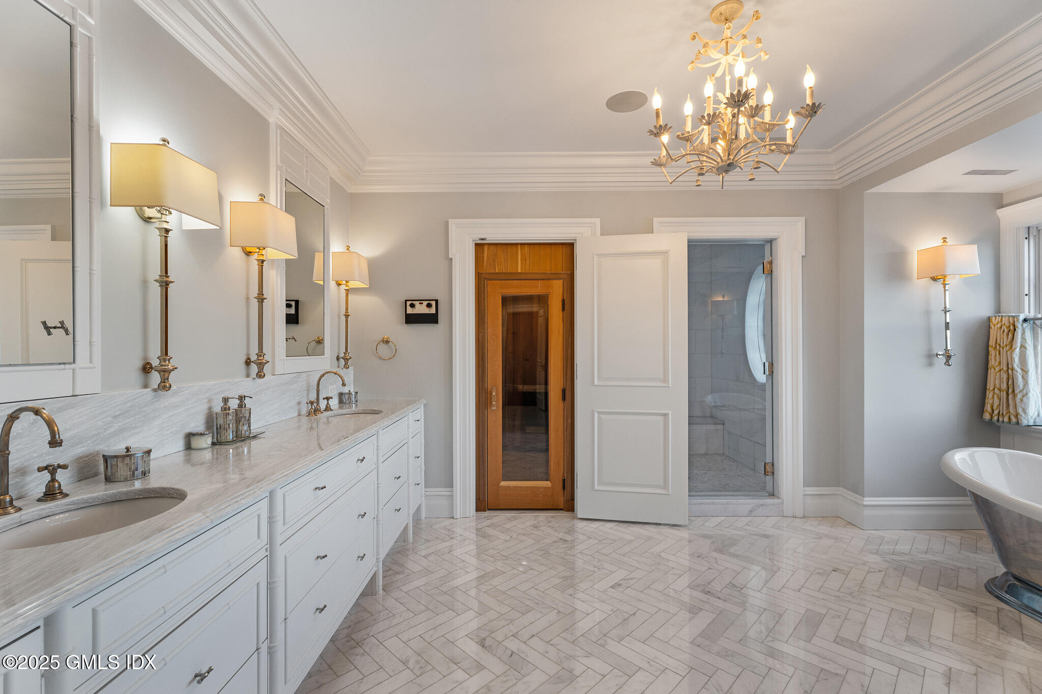 545 Indian Field Road Greenwich, CT 06830 - Photo 23 of 39 a spacious bathroom with double sink and a mirror