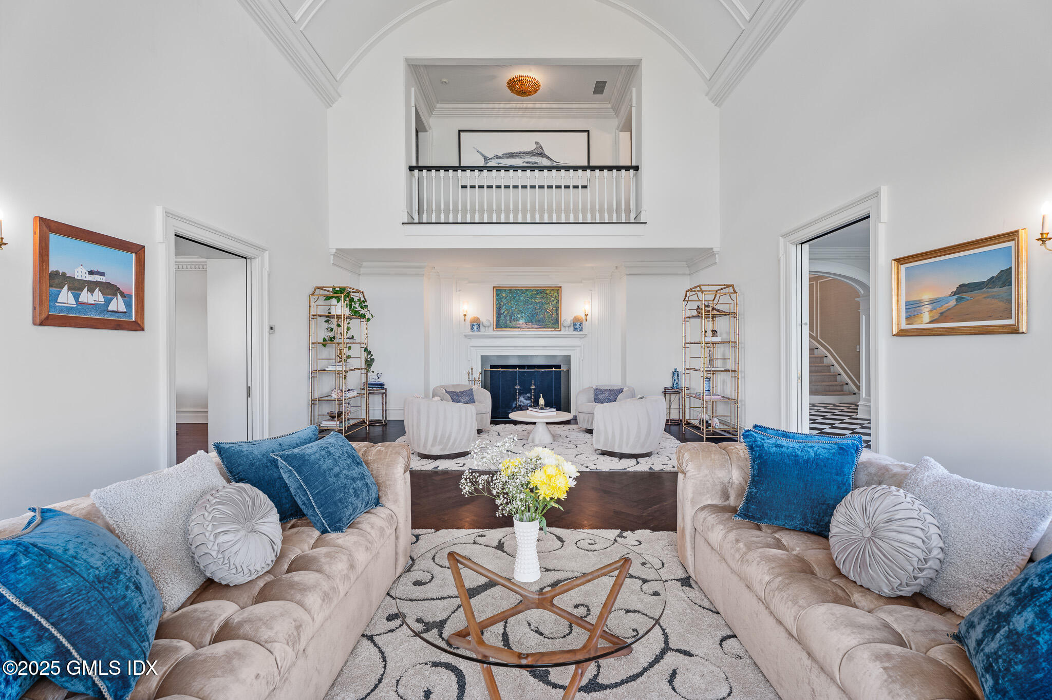 545 Indian Field Road Greenwich, CT 06830 - Photo 6 of 39 a living room with fireplace furniture and a wooden floor