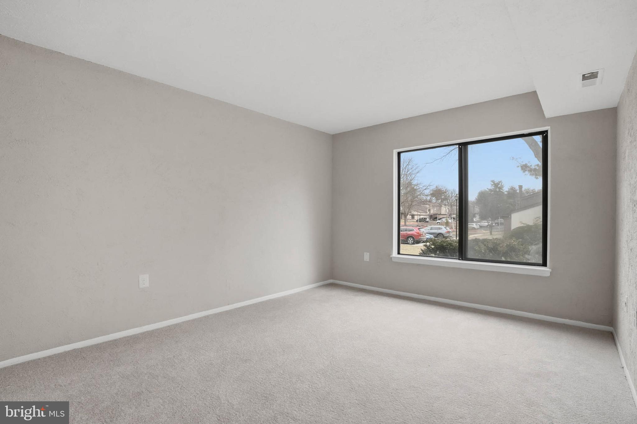 10943 Trotting Ridge Way, Unit 2 Columbia, MD 21044 - Photo 9 of 31 Primary Bedroom