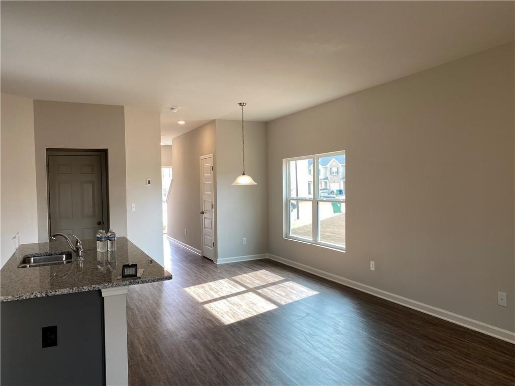 3577 Brycewood Drive Decatur, GA 30034 - Photo 5 of 13 a bathroom with a granite countertop sink and a mirror