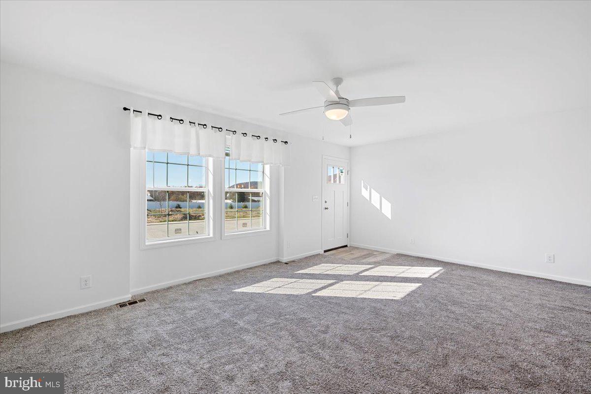 1410 Heytesbury Road Walnutport, PA 18088 - Photo 7 of 37 Bright and airy living space awaits.