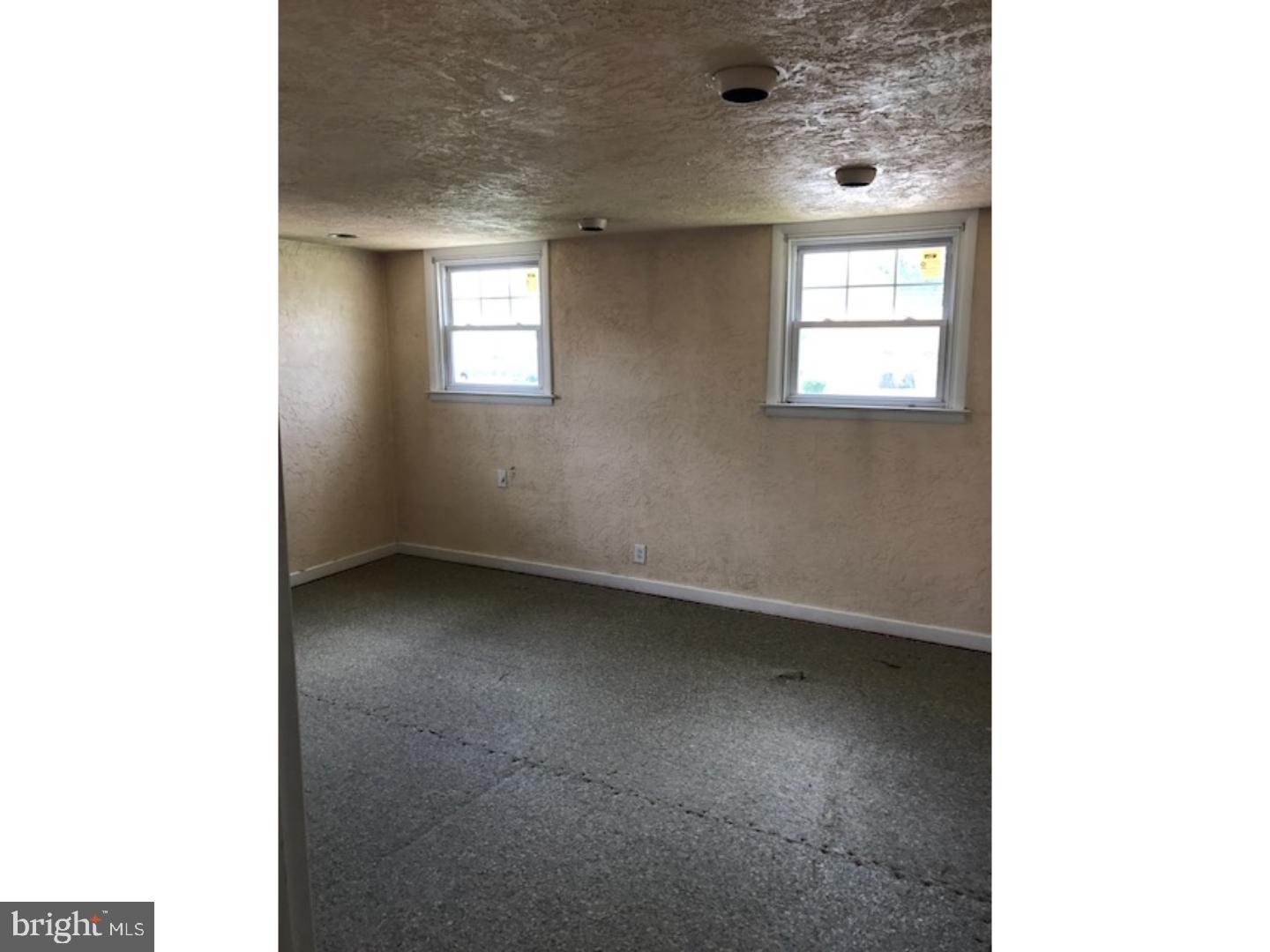 9963 Verree Road Philadelphia, PA 19115 - Photo 8 of 17 a view of an empty room with a window