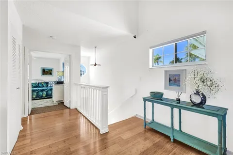 a bed room with a bed and a window