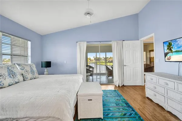 a bathroom with mirror sink and toilet