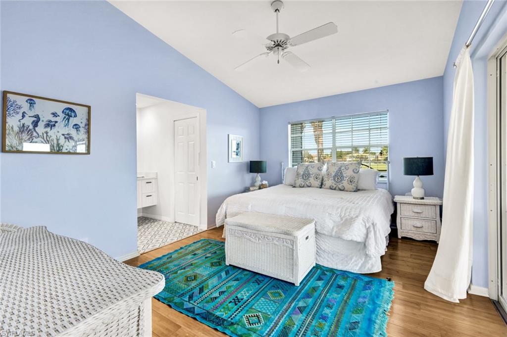 14985 Rivers Edge Court, Unit 236 Fort Myers, FL 33908 - Photo 18 of 33 a bed room with a bed and a window