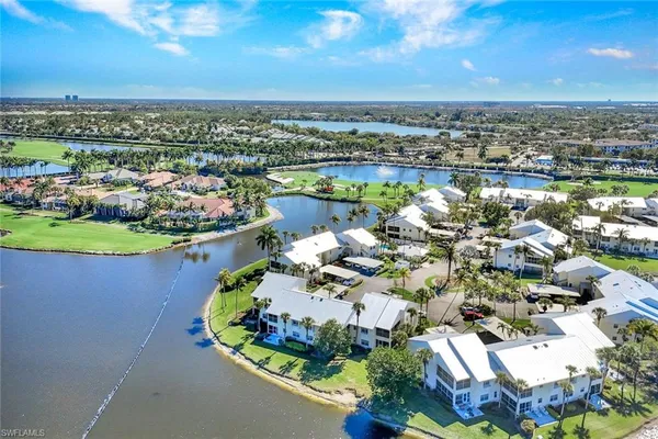 an aerial view of a house with a swimming pool