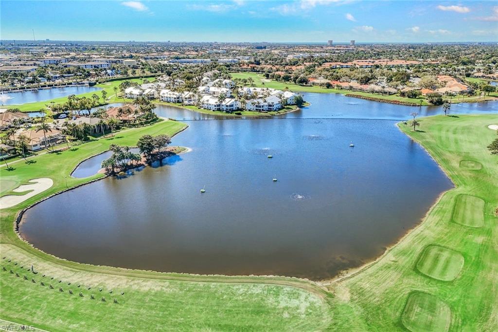 14985 Rivers Edge Court, Unit 236 Fort Myers, FL 33908 - Photo 28 of 33 an aerial view of a house with a lake view
