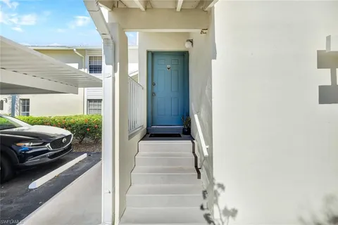 a view of a livingroom with furniture and window
