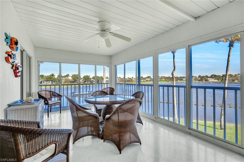 14985 Rivers Edge Court, Unit 236 Fort Myers, FL 33908 - Photo 5 of 33 a dining room with furniture water view and garden view