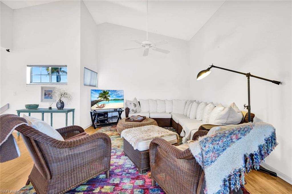 14985 Rivers Edge Court, Unit 236 Fort Myers, FL 33908 - Photo 7 of 33 a living room with furniture and a couch