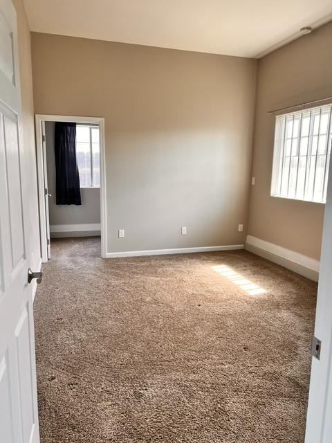 3019 Lathrop Road Manteca, CA 95336 - Photo 38 of 43 an empty room with windows and closet